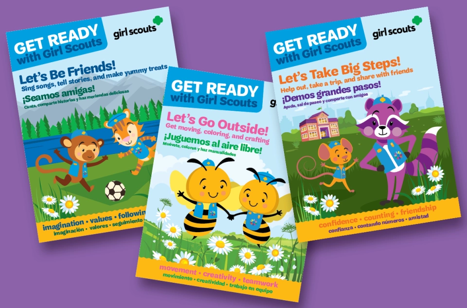 three booklets on a purple background