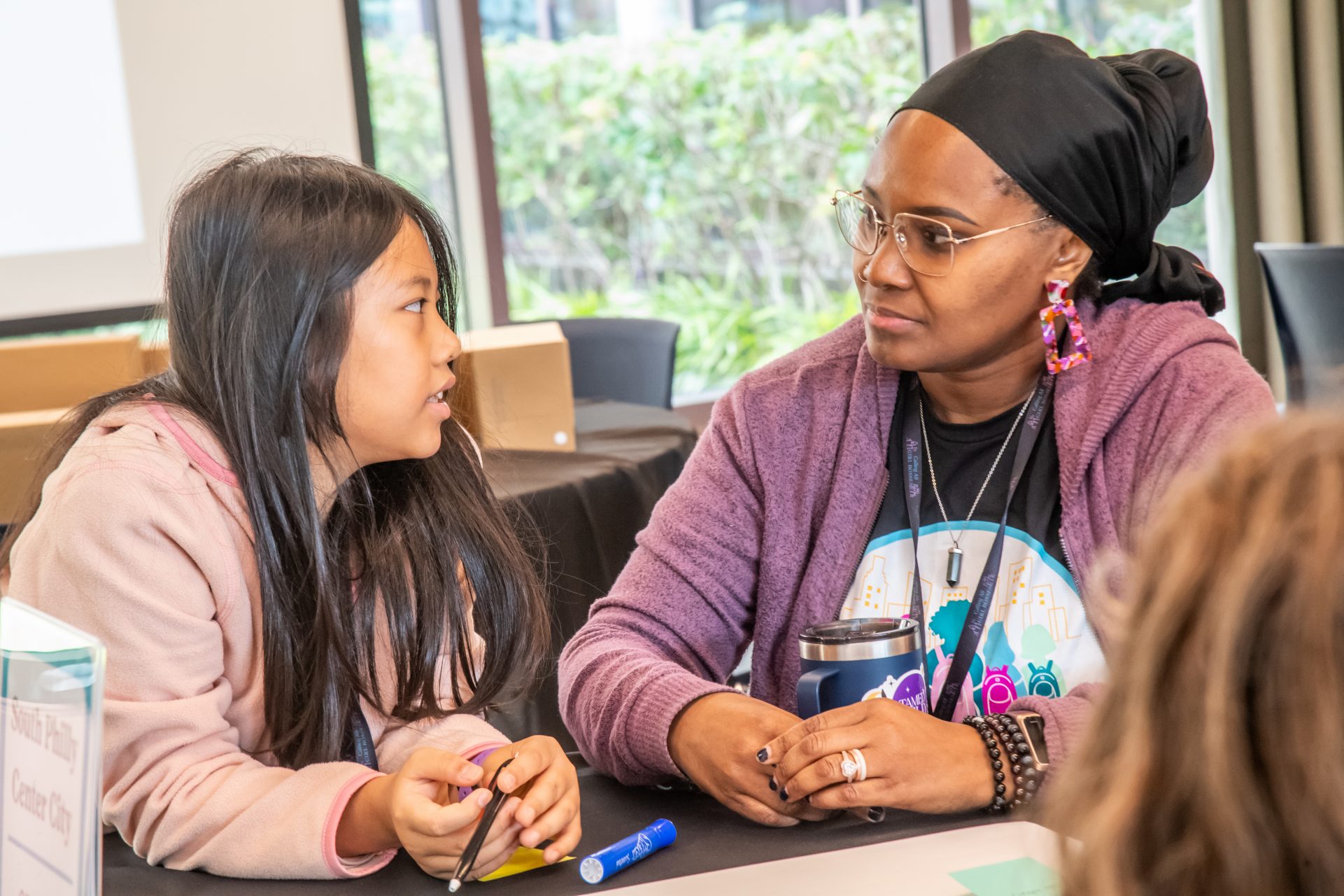 Girl Boss with volunteer