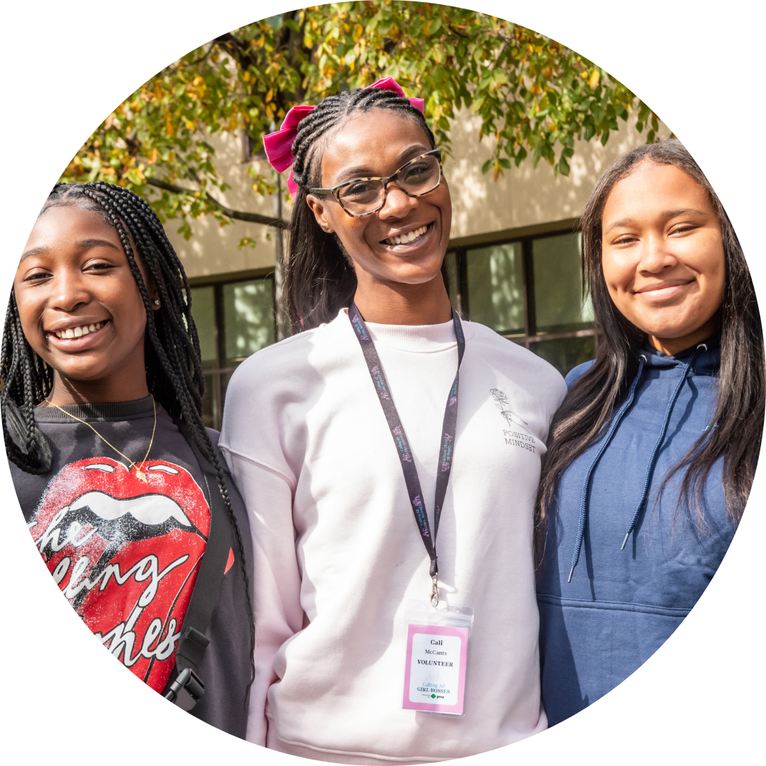 Girl Bosses with volunteer in the center